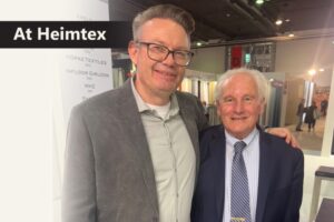 Thomas Prusko, sales director for Hopke, Niederfullbach, Germany with Ken Gold, owner of Doral Fabrics, New York